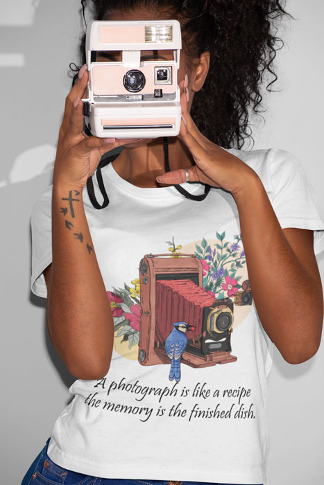 t-shirt-mockup-featuring-a-woman-taking-a-picture-with-a-polaroid-camera-21902